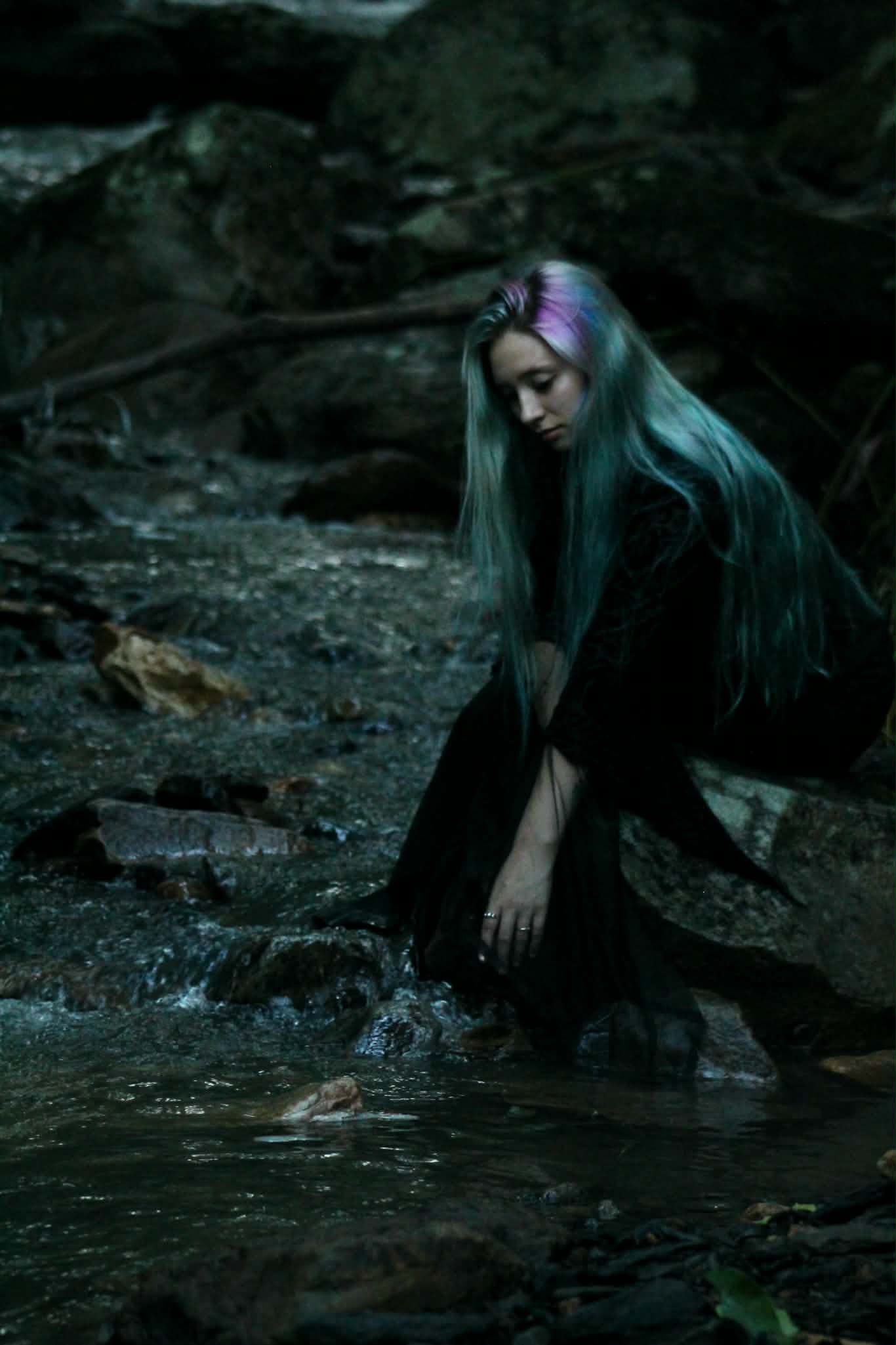 A portrait by the water